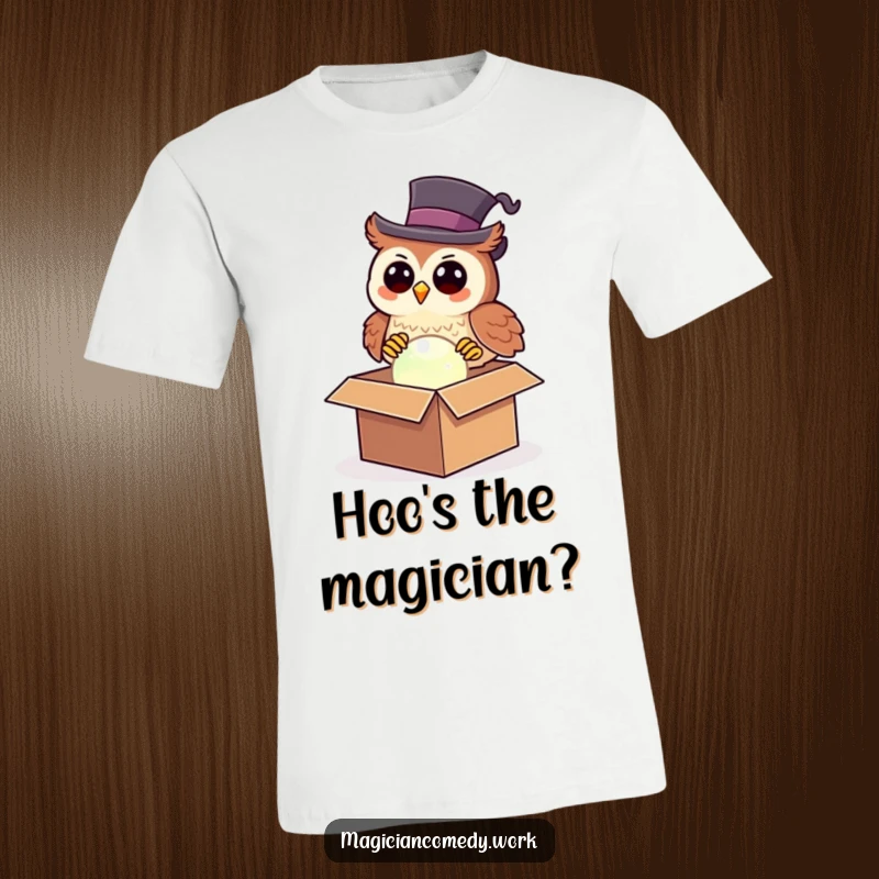 Funny owl magician t-shirt featuring a happy owl in a top hat pulling a glowing orb from a box, perfect for gifting.