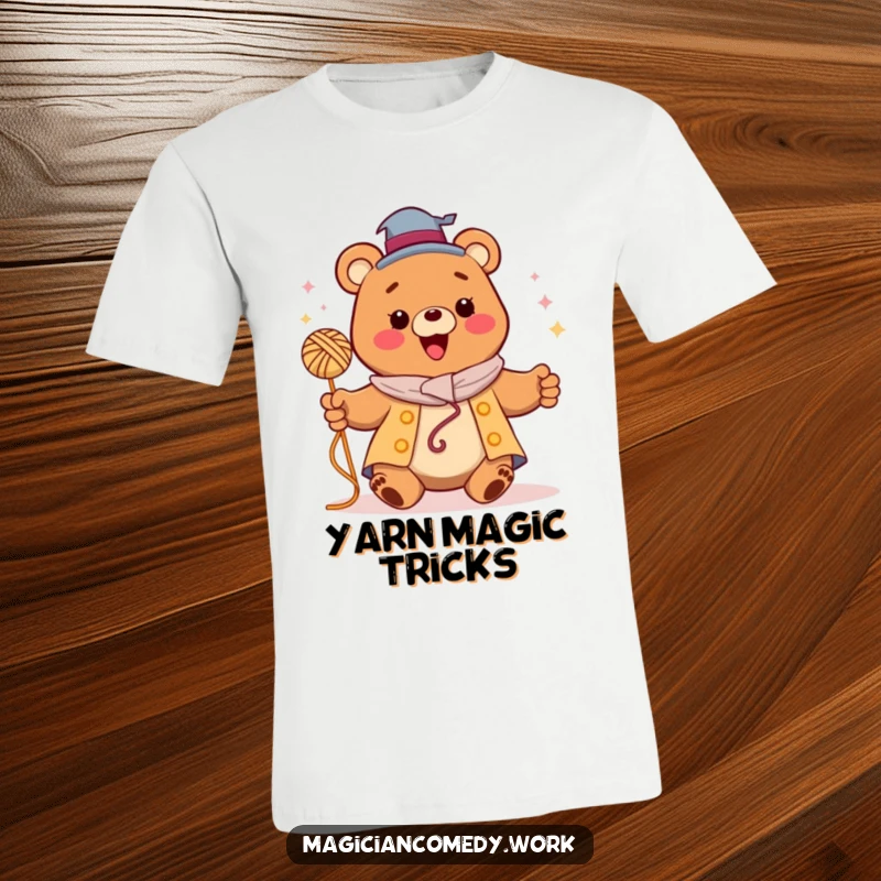 Funny bear magician t-shirt, a happy bear levitating a ball of yarn, showcasing playful and charming magic.
